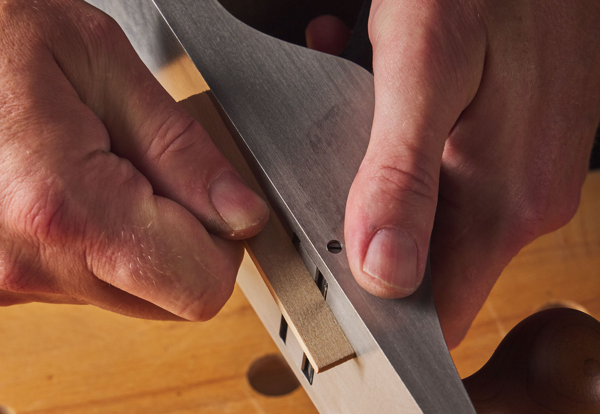 Setting the blade with a scrap of wood