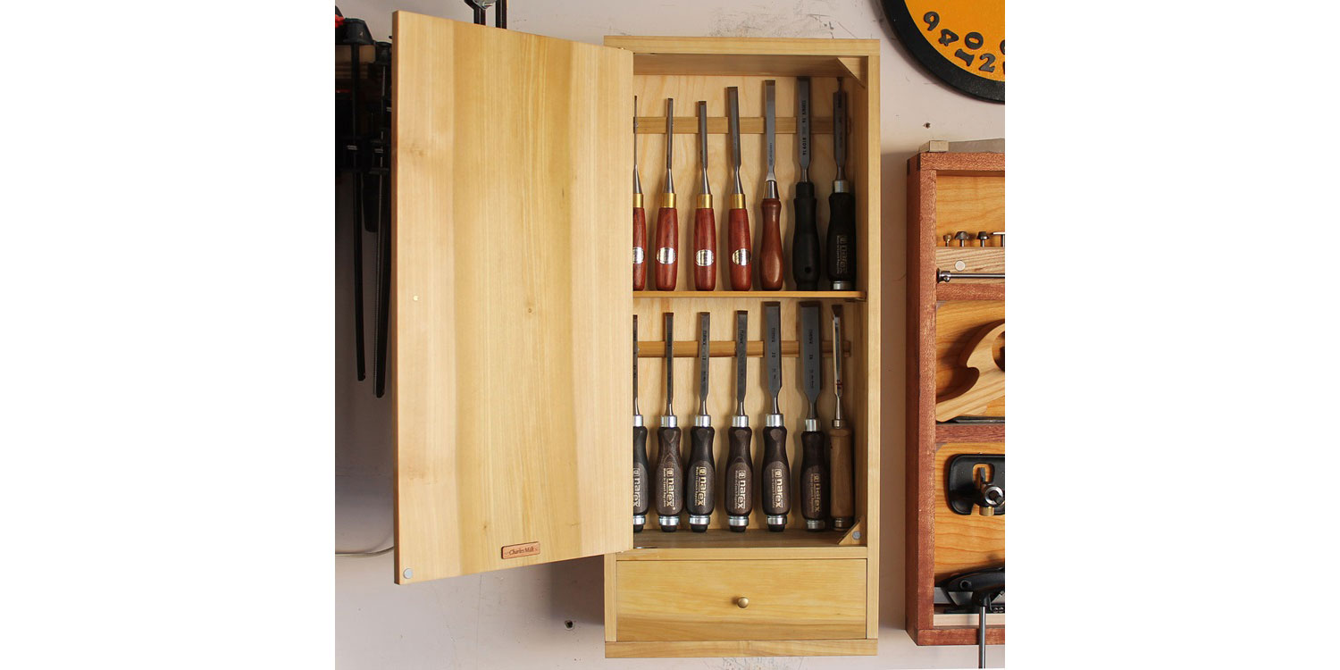 Custom-made cabinet for chisel storage.