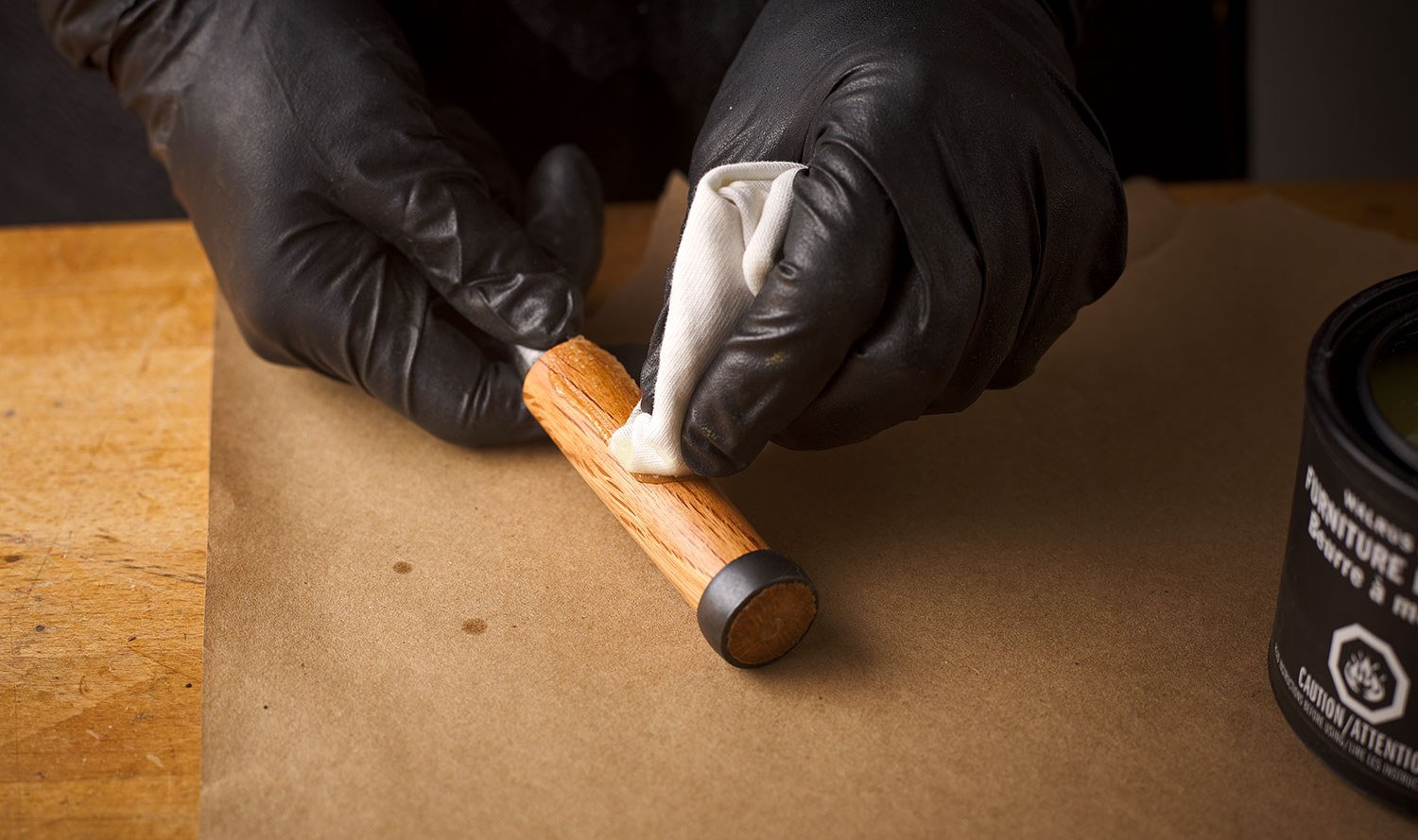 Applying an oil finish to the chisel handle.