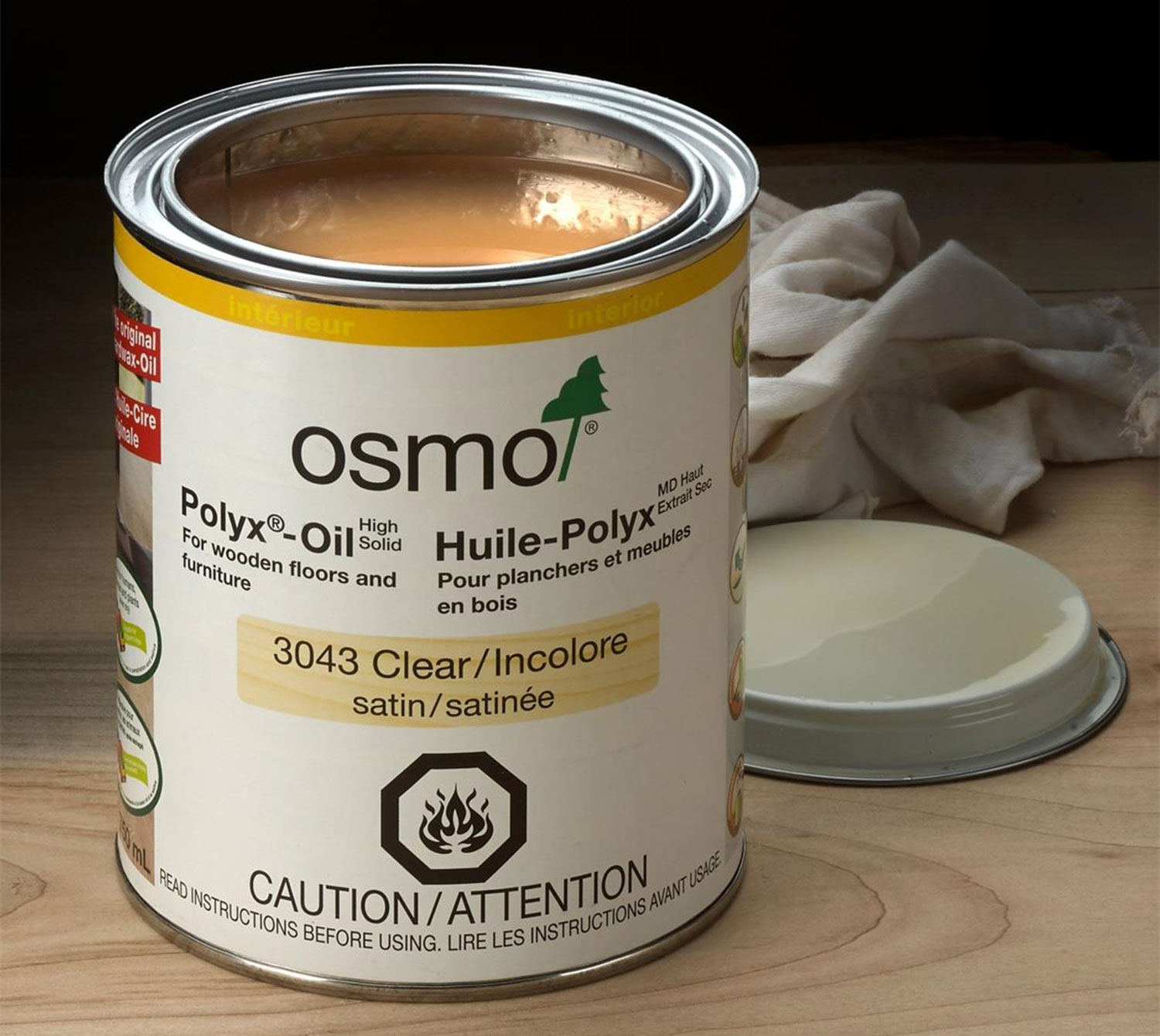 A 125ml can of Osmo Polyx sits atop an unfinished wooden surface.