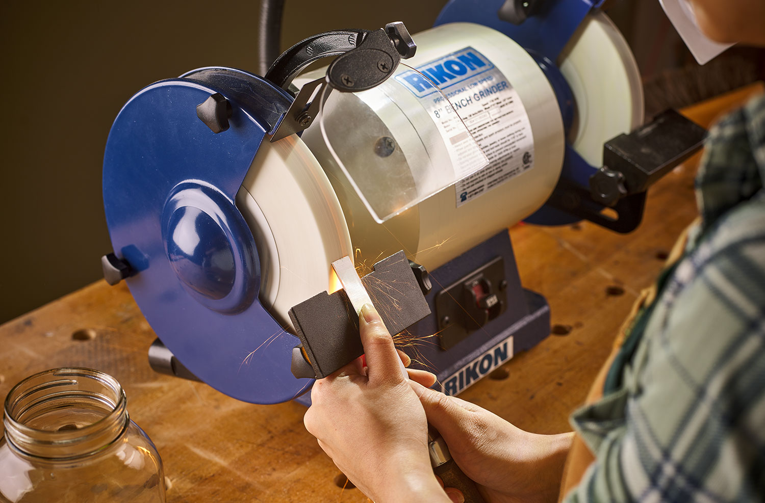 Grinding a chisel bevel on the Rikon grinder.
