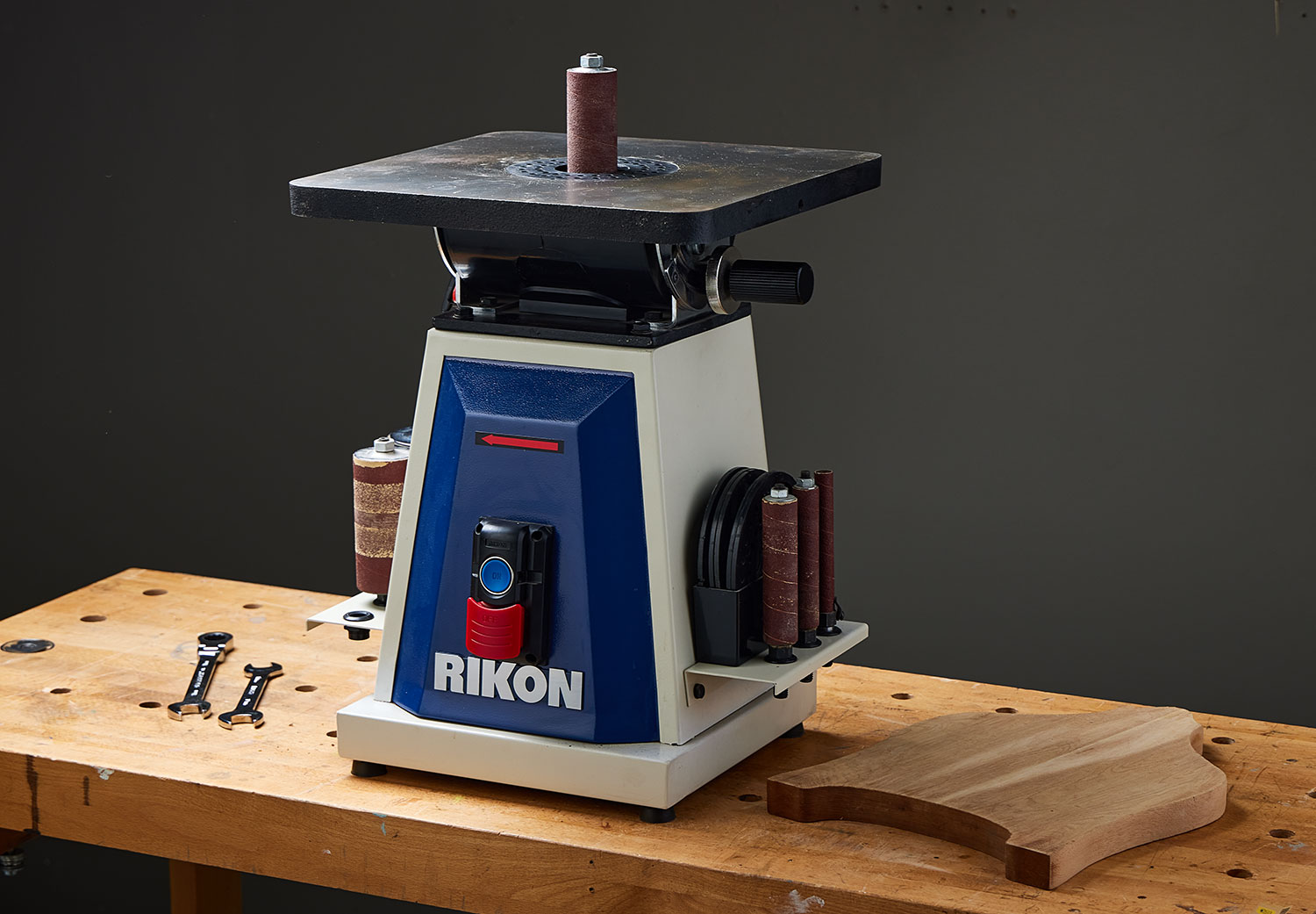 The Rikon oscillating spindle sander atop a workbench.