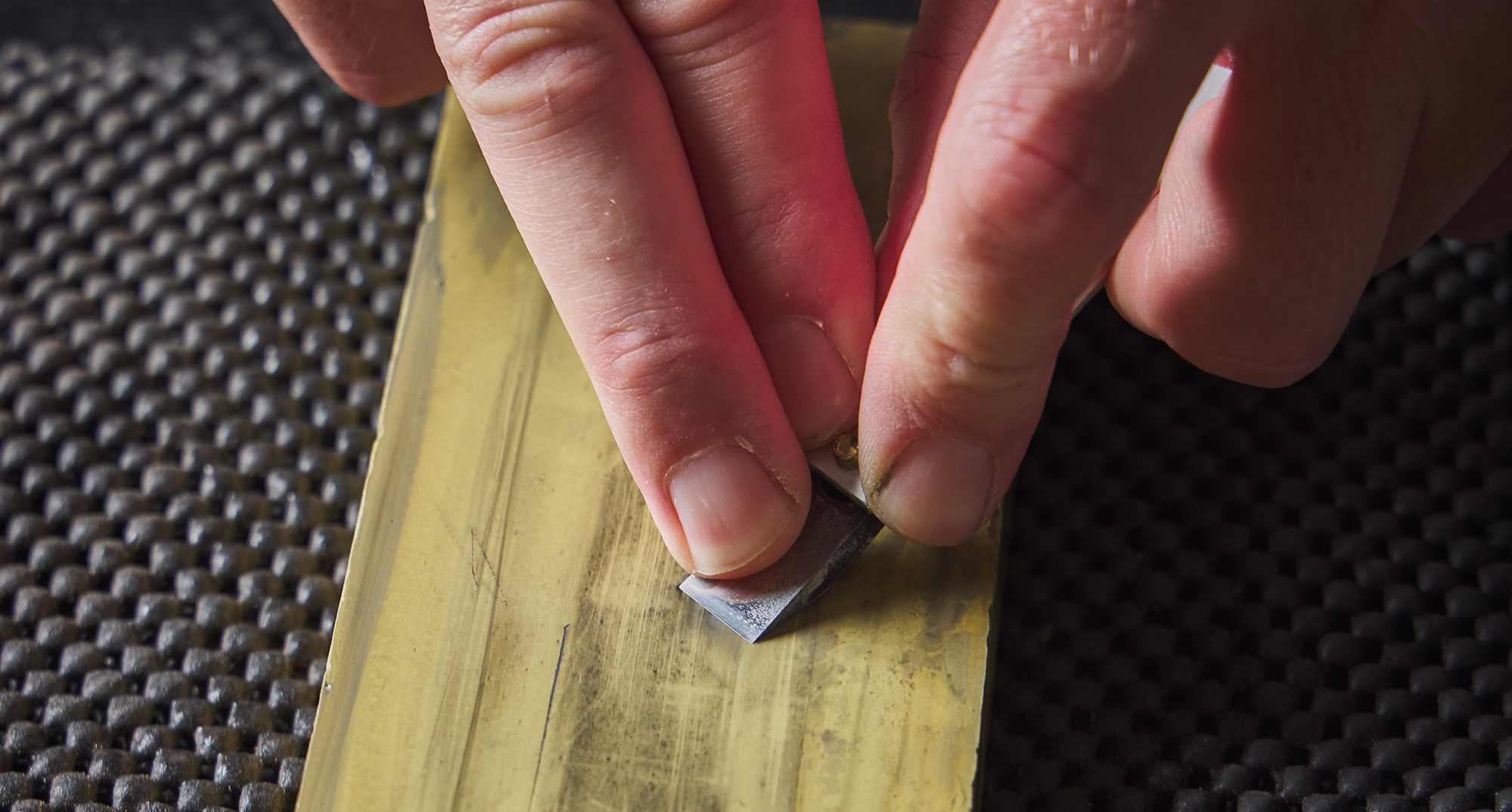 Sharpening a two-piece blade on a sharpening stone