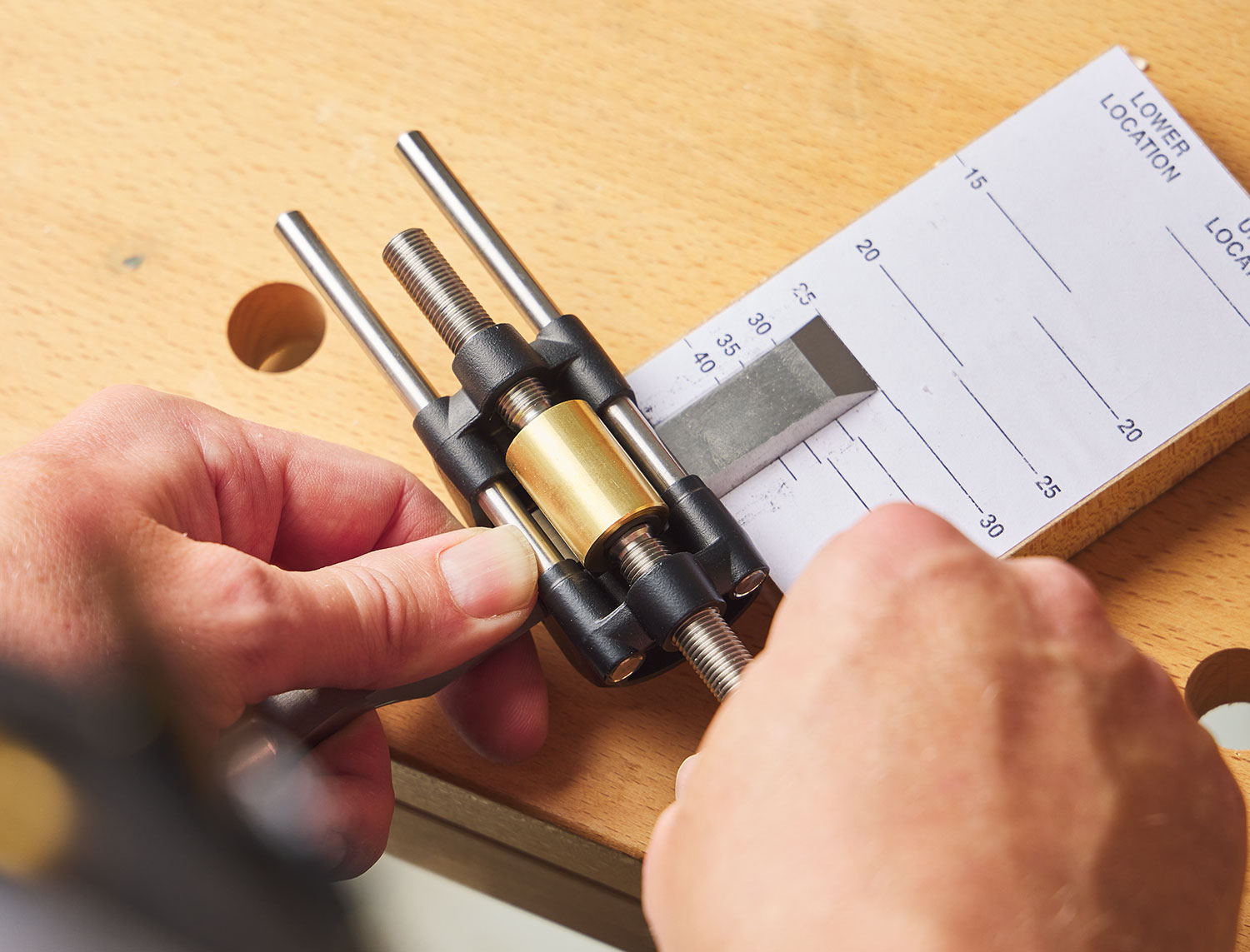 Tighten the locking knob after the tool is projected to the desired length on the template.