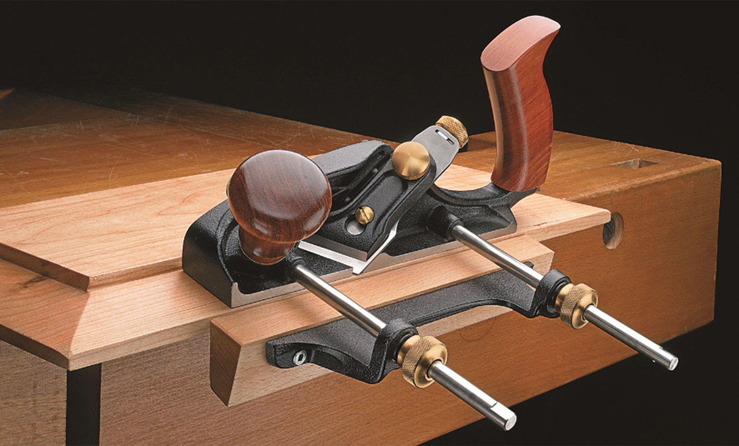 A Veritas skew rabbet plane with optional 6” rods and a user-made wooden fence extension installed.
