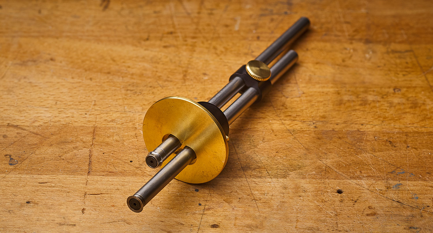 A Veritas dual marking gauge placed on a workbench