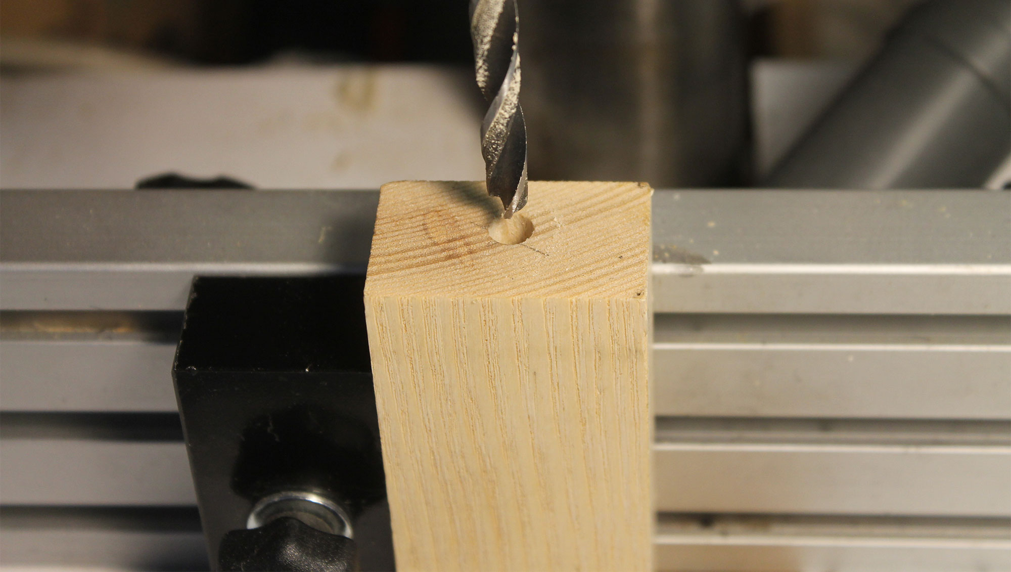 The off-center clamping block.